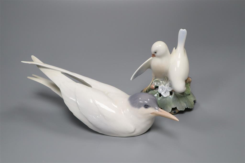 Two Royal Copenhagen bird models, no.827 and no.409